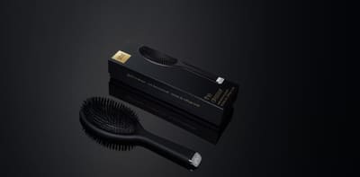 The Dresser — oval dressing brush
